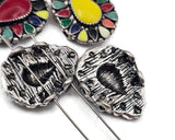 These striking 2 hole slider beads feature a colorful mosaic teardrop centerpiece with antique silver metal detailing. Designed as metal slide spacer beads for two strand bracelet and necklace jewelry making, they work beautifully with seed beads, duo beads, gemstone beads, or leather cord designs. Perfect for bohemian jewelry, statement bracelets, colorful artisan jewelry, and DIY beading projects.