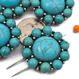 Southwestern turquoise 2 hole slider beads with a large round turquoise style center stone and surrounding accent beads in antique silver metal. These metal slide spacer beads are perfect for two strand double bracelet necklace jewelry making and sit beautifully between seed beads, duo beads, gemstone beads, or metal spacer beads. Ideal for western jewelry designs, rustic boho bracelets, and handmade DIY beading supplies.