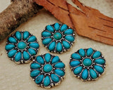 Create bold southwestern jewelry with these turquoise floral 2 hole slider beads featuring oval turquoise stones surrounding a center turquoise cabochon. Set in antique silver metal with decorative bead accents, these metal slide spacer beads are perfect for double strand bracelet and necklace jewelry making. They pair beautifully with seed beads, duo beads, gemstones, and leather cords for boho, western, and handmade DIY jewelry designs.