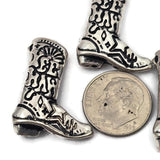 Celebrate country style with these detailed Yee Haw cowboy boot slider beads. Designed with two holes on the back, these beads are perfect for double-strand bracelet designs, leather jewelry, and rustic western creations. The engraved boot features bold western details and playful “Yee Haw” lettering that makes it a standout piece. Perfect for jewelry makers creating rodeo inspired accessories or fun country themed jewelry designs.
