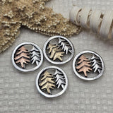 Bring a woodland theme to your handmade jewelry with these two hole pine tree slider beads. The light pewter silver frame and layered tree design create a beautiful rustic focal bead for double strand bracelets and necklaces. These beads combine beautifully with seed beads, superduo beads, Czech glass beads, crystal beads, and metal spacer beads for forest jewelry, nature themed accessories, and handmade artisan designs.