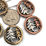 These detailed woodland tree slider beads feature layered pine tree silhouettes set inside rustic bronze and copper tone frames. The two hole design makes them ideal for double strand bracelets and necklaces using leather cord or beading wire. Pair them with seed beads, superduo beads, Czech glass beads, gemstone beads, and metal spacer beads to create nature jewelry, forest themed accessories, and rustic handmade designs.