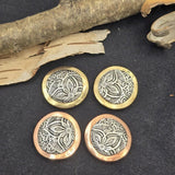 These metal floral focal slider beads feature an intricate western inspired flower design set in a mixed metal round frame. Their detailed pattern and bold shape make them perfect for statement bracelets and necklaces. Designed with two holes on the back, they work beautifully in double strand jewelry designs. Ideal for rustic jewelry, boho western accessories, southwestern designs, and artisan handmade jewelry.