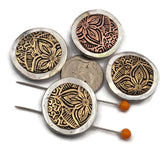Add rustic western charm to your jewelry designs with these ornate floral two hole slider beads. Featuring a detailed metal flower pattern set inside a silver tone frame with antique brass and copper accents, these beads make beautiful focal pieces. The two hole design is perfect for double strand bracelets and necklaces using leather cord, beading wire, or thread. Ideal for western jewelry, boho accessories, southwestern bracelets, and handmade artisan designs.