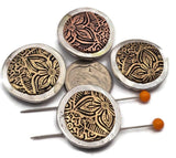 These beautiful western style floral slider beads feature intricate metal detailing with a raised flower design surrounded by a rustic mixed metal frame. Designed with two holes on the back, they are perfect for double strand bracelet projects and layered necklace designs. Jewelry makers love using these beads as focal pieces for boho western jewelry, southwestern accessories, rustic handmade bracelets, and artisan jewelry creations.