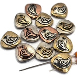 These unique teardrop bird beads showcase a beautiful two‑tone look in silver, gold, and copper with a bold swirl‑wing bird detail. Ideal as focal beads or standout spacers, they’re perfect for bird‑themed bracelets, necklaces, and charm jewelry. Pair with seed beads, turquoise, or earthy gemstones to create layered, mixed‑metal designs. Their substantial teardrop shape adds a high‑end, artisan feel to your beading and crafting supplies.