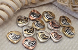 These boho mixed‑metal bird beads are perfect for jewelry makers who love nature and vintage style. With a raised songbird motif and antiqued silver, brass, and copper tones, these teardrop beads work beautifully as focal beads or bold spacers. Mix them with seed beads, pearls, or gemstone beads to create bracelets, necklaces, and charm jewelry. Ideal for crafting, wire wrapping, beading projects, and unique handmade designs.
