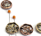Looking for beads that add instant detail? These round floral slider beads feature an embossed flower and vine design in warm antique copper and brass finishes. With two holes for secure stringing, they work as bracelet connectors or necklace focal beads, keeping strands aligned and flat. Combine with seed beads, turquoise, jasper, or pearls for boho and vintage jewelry. Great for crafting, beading projects, and jewelry making supplies.