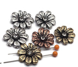 Add inspiration to your jewelry with these 2‑hole flower slider beads featuring engraved words like Hope, Joy, Love, Peace, and Dream. Each antiqued metal daisy is accented with a sparkling clear rhinestone center. These focal beads are perfect for multi‑strand bracelets and necklaces, keeping strands aligned and secure. Pair with seed beads, gemstone beads, or pearls for meaningful, boho‑chic handmade jewelry and thoughtful DIY gifts.