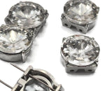 These stunning clear rhinestone 2 hole slider beads are set in a sleek silver tone metal for maximum shine and durability. The large faceted stone creates a bold focal point for bracelet and necklace designs. Ideal for jewelry making with seed beads, duo beads, or gemstone beads, these spacers bring a luxurious, high-end feel to both modern and classic handcrafted pieces.