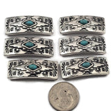2 hole slider beads with western turquoise style design in antique silver metal with a turquoise colored center stone. These metal slide spacer beads are perfect for two strand double bracelet and necklace jewelry making, pairing beautifully with seed beads, duo beads, gemstone beads, and leather cord. Ideal for western jewelry, boho bracelet designs, southwestern style jewelry, and DIY beading projects, these unique jewelry making components and findings.
