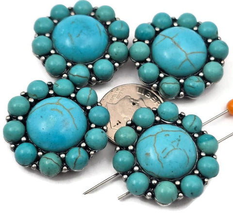 2 hole slider beads with large turquoise style centerpiece in antique silver metal with surrounding turquoise accent beads. These bold metal slide spacer beads are perfect for two strand double bracelet and necklace jewelry making, pairing beautifully with seed beads, duo beads, gemstone beads, or leather cord designs. Ideal for western jewelry, southwestern bracelet designs, boho jewelry projects, and DIY beading supplies, these striking jewelry making components and findings .