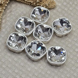These faceted crystal square slider beads in silver bezel setting are gorgeous rhinestone connectors for layered bracelets and multi-strand necklaces. Double hole spacer beads perfect for bead weaving, stringing, and jewelry making. A stunning unique finding compatible with tile beads, carrier beads, CzechMates, and SuperDuo two hole bead designs.