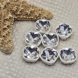These square cut glass rhinestone 2 hole slider beads in silver bezel setting are timeless unique findings for jewelry makers and crafters. Perfect double hole spacer beads for bridal necklaces, formal bracelets, and bead weaving projects. Compatible with CzechMates, SuperDuo, lentil beads, and other two hole beading components.