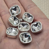 These silver bezel square rhinestone slider beads are show-stopping unique findings for any jewelry collection. Brilliant faceted cut glass double hole spacer beads perfect for bridal jewelry, statement necklaces, and layered bracelets. Great for bead weaving, stringing, and wire wrapping alongside SuperDuo, CzechMates, and carrier bead components.