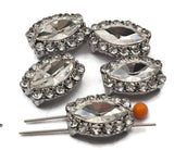 Glamorous clear rhinestone oval focal beads with encrusted platinum silver border and double hole construction. These rare 2 hole slider beads are perfect for bridal jewelry, statement necklaces, and bead weaving projects like peyote stitch and loom work. Pair with semi-precious stones, crystal beads, and SuperDuo as supporting beads. Hard to find unique jewelry making findings.
