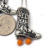 Create charming western jewelry with these beautifully detailed cowboy boot Yee Haw slider beads. The engraved boot design features classic western patterns and bold lettering that celebrates country style. Each bead includes two holes on the back, making them ideal for double-strand bracelet projects or creative necklace designs. Perfect for jewelry designers who love rustic, rodeo, or country themed creations with a fun statement piece.