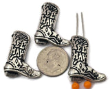 These Yee Haw cowboy boot 2-hole slider beads are perfect for adding western flair to your jewelry designs. The highly detailed boot features engraved patterns and playful lettering that makes it stand out in handmade bracelets and necklaces. With two holes on the back, they are designed for double-strand projects using leather, cord, or wire. A great focal bead for country jewelry, rodeo accessories, and rustic designs.