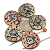 Create stunning coastal jewelry with these sand dollar two hole slider beads. Each bead features a raised sand dollar center with antique silver detailing and a decorative metal frame. The two hole design makes them ideal for double strand bracelet designs using leather cord, waxed cotton, or wire. Perfect for jewelry makers creating beach jewelry, ocean themed accessories, and sea life inspired handmade pieces.