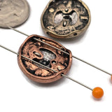 These detailed sand dollar sea life beads add coastal charm to handmade jewelry projects. Featuring a raised silver sand dollar center and decorative antique frame, they make a beautiful focal bead in double strand bracelets and necklaces. The two hole design allows for easy use with leather cord, round cord, or wire. Perfect for beach themed jewelry, ocean inspired designs, and nautical accessories.