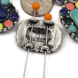 Bring vibrant color to your jewelry designs with these western enamel two hole beads. The detailed metal setting and colorful enamel accents create a bold southwestern style focal bead. Perfect for double strand bracelets, leather jewelry, and statement necklaces. A wonderful bead for jewelry makers creating cowgirl jewelry, boho accessories, western bracelets, and colorful handmade designs.