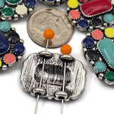 These detailed colorful western slider beads feature bright enamel accents surrounding a raised center design. The vibrant colors and antique metal setting create a beautiful southwestern and boho style look. With two holes on the back, they are perfect for double strand bracelet designs using leather cord or beading wire. Ideal for cowgirl jewelry, western accessories, and bold handmade jewelry designs.