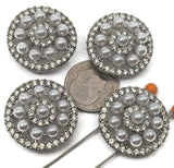 Create elegant jewelry with these 2 hole slider beads featuring luminous faux pearls surrounded by sparkling rhinestone accents. The circular design adds a refined, vintage-inspired look to bracelet and necklace designs. Perfect for pairing with seed beads, duo beads, or crystal beads, these spacers bring texture, shine, and a high-end aesthetic to your jewelry making projects.