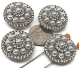These platinum silver metal slider beads feature a stunning pearl center with concentric circles of rhinestone sparkle. Designed with two holes for secure double strand jewelry making, they are perfect for bracelets and necklaces. Pair with seed beads, duo beads, or gemstone beads to create luxurious, eye-catching designs with a timeless and elegant appeal.