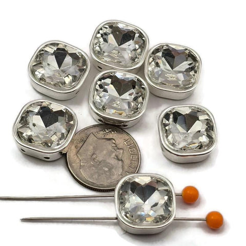 Crystal clear square rhinestone connector beads in silver bezel setting. These 2 hole spacer beads are perfect unique findings for bridal necklaces, wedding bracelets, and formal jewelry making. Use in bead weaving, peyote stitch, and wire wrapping projects. Compatible with CzechMates, SuperDuo, and double hole beading systems loved by beaders and crafters.