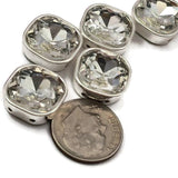 Brilliant square rhinestone connector beads with full platinum silver bezel setting. These clear 2 hole spacer beads are stunning unique findings for wedding headpieces, bridal jewelry, and statement earrings. Use in stringing, wire wrapping, and peyote stitch projects. Compatible with tile beads, carrier beads, CzechMates, and double hole bead designs.