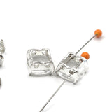 These dazzling square resin rhinestone double hole focal beads in platinum silver prong setting deliver brilliant sparkle without the weight of glass. Rare hard to find 2 hole slider beads perfect for bridal jewelry, bohemian statement pieces, and bead weaving projects. Pair with seed beads, Czech glass, hematite, and semi-precious stone chips around them.