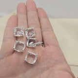 Lightweight clear rhinestone square focal beads with open back platinum silver prong setting — all the sparkle of glass with none of the weight. These rare 2 hole slider beads are perfect for bead weaving, earrings, and multi-strand necklace designs. Pair with seed beads, crystal beads, amethyst chips, and Czech glass as supporting components.