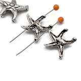 These detailed antique silver starfish 2 hole slider beads are stunning coastal focal beads perfect for beach inspired jewelry, nautical necklaces, and boho bracelet designs. Rare hard to find metal findings with rich time-worn finish. Pair with turquoise chips, freshwater pearls, coral, seed beads, and sea glass colored beads as supporting components around them.