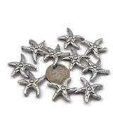 Detailed antique silver double hole starfish focal beads with time-worn aged finish. These rare 2 hole slider beads are stunning hard to find findings for coastal jewelry, beach inspired bracelets, and boho necklace designs. Pair with turquoise, sea glass colored beads, coral, hematite, and freshwater pearls as supporting components around them.