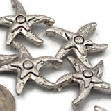 Antique silver starfish double hole focal beads with intricate detail and rich aged finish — rare hard to find coastal findings perfect for beach jewelry, boho designs, and Southwestern statement pieces. These 2 hole slider beads anchor beautifully in peyote stitch and loom work alongside turquoise, hematite, coral, freshwater pearls, and seed beads.