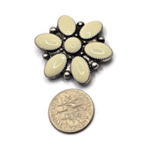 Flower-inspired focal beads with cream enamel coloring and vintage-style antique silver metalwork. The symmetrical petal arrangement creates a timeless floral appearance suitable for many jewelry styles. Perfect for handmade bracelets, necklaces, earrings, pendants, bead weaving, and custom jewelry projects that require decorative floral focal beads.