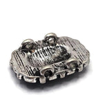 Antique silver 2 Hole Slider Bead featuring a smooth black center stone and matching black oval stones around the perimeter. The substantial size creates a strong focal element in jewelry designs. Shown with a dime and beading pins for reference, these beads are perfect for western bracelets, necklaces, pendants, leather jewelry, bead weaving projects, and artisan handmade accessories.