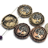 Round slider beads featuring raised Eternal Life Tree designs framed by decorative borders and vintage-inspired metalwork. The mixed metal package includes both warm antique copper and light antique gold finishes. Ideal for custom jewelry, bracelets, necklaces, bead weaving, artisan creations, and symbolic jewelry making projects.