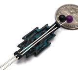Mixed metal geometric slider beads with faux turquoise center stones displayed beside a dime for scale. The assortment includes verdigris patina, antique copper, antique silver, and antique brass finishes. Decorative floral details and angular western-inspired shapes create distinctive focal components. These 2 Hole Slider Beads are ideal for Bracelet Making, Necklace Designs, custom jewelry, leather accessories, artisan beadwork, and handcrafted Southwestern jewelry collections.