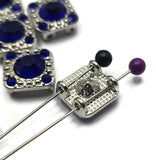 Add vibrant blue sparkle to your next jewelry project with these Sapphire Blue Rhinestone 2 Hole Slider Beads. Featuring an antique silver finish and a faceted center stone surrounded by accent rhinestones, these focal beads are perfect for handmade bracelets, necklaces, earrings, and pendants. Their dual-hole construction makes them easy to incorporate into multi-strand jewelry, bead weaving projects, and a variety of jewelry making techniques.