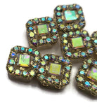 These beautiful Clear AB Slider Beads combine brilliant Aurora Borealis rhinestones with a bright gold finish for a timeless and elegant look. The faceted center stone is surrounded by coordinating accent rhinestones that create sparkle from every angle. Ideal for handmade bracelets, necklaces, earrings, pendants, leather jewelry, and custom jewelry projects, these focal beads add eye-catching detail while providing excellent versatility for jewelry makers.