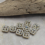 These decorative Rhinestone Slider Beads combine brilliant clear rhinestones with a bright gold finish for a sophisticated and versatile look. Their square shape and dual-hole design make them ideal for bracelet making, necklace designs, earrings, pendants, and matching jewelry sets. Jewelry makers will appreciate how easily they integrate into bead weaving, Peyote Stitch, loom work, and other handmade jewelry