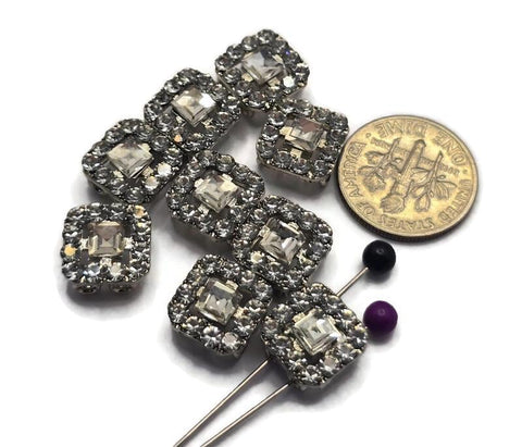 Add timeless sparkle to your jewelry designs with these Clear Rhinestone 2 Hole Slider Beads. Featuring brilliant clear rhinestones set in a platinum silver finish, these focal beads are ideal for bracelet making, necklace designs, earrings, pendants, and multi-strand jewelry. Their dual-hole construction makes them perfect for bead weaving, Peyote Stitch, loom work, and artisan jewelry projects while providing both decorative beauty and versatility.