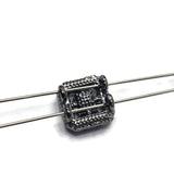 These beautiful Jet Rhinestone Slider Beads combine rich black sparkle with a sleek gun metal finish. The faceted center stone is surrounded by coordinating Jet accent rhinestones that create depth and dimension throughout the design. Perfect for handmade bracelets, necklaces, earrings, pendants, and custom jewelry projects, these focal beads offer versatility while complementing modern, gothic, and contemporary jewelry styles.