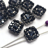These Jet Rhinestone 2 Hole Slider Beads offer a beautiful combination of dark elegance and modern styling. The gun metal finish complements the sparkling black rhinestones while the dual-hole construction supports bracelet making, necklace designs, multi-strand jewelry, and bead weaving projects. Their versatile design makes them valuable additions to any collection of jewelry findings and jewelry making supplies.