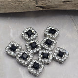 Add timeless elegance to your jewelry designs with these Jet and Clear CZ Rhinestone 2 Hole Slider Beads. Featuring a dramatic Jet center rhinestone surrounded by sparkling Clear CZ accents in a platinum silver finish, these focal beads create beautiful contrast and brilliance. Perfect for bracelet making, necklace designs, earrings, pendants, and multi-strand jewelry, their dual-hole construction also makes them ideal for bead weaving, Peyote Stitch, and loom work projects.