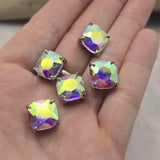 These decorative 2 Hole Slider Beads feature large Clear AB CZ rhinestones in elegant platinum silver prong settings. Their dramatic size and brilliant Aurora Borealis finish make them perfect focal beads for bracelets, necklace designs, pendants, and matching jewelry sets. The two-hole construction allows for easy incorporation into multi-strand jewelry, bead weaving, Peyote Stitch, and Loom Work techniques.