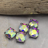Perfect for jewelry makers who love sparkle and statement designs, these Large Clear AB CZ Rhinestone Slider Beads provide exceptional brilliance and versatility. The platinum silver finish enhances the color-shifting Aurora Borealis effect while the dual-hole construction offers stability within bracelets, necklaces, earrings, pendants, bead weaving, and artisan jewelry projects. These focal beads create unforgettable handmade jewelry designs.