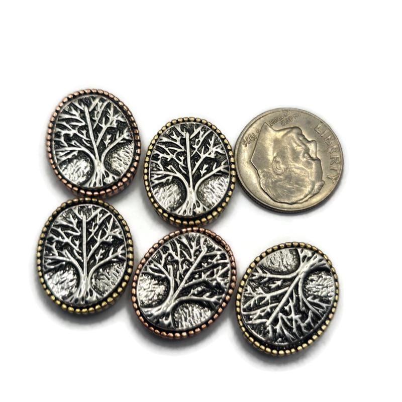 Add meaningful detail to your jewelry designs with these Tree of Life 2 Hole Slider Beads. Featuring antique brass and antique copper finishes with raised tree designs, these focal beads symbolize growth, strength, and connection. Perfect for bracelet making, necklace designs, pendants, and artisan jewelry, their dual-hole construction makes them ideal for multi-strand jewelry, bead weaving, and custom handmade jewelry projects inspired by nature.