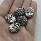Featuring detailed Tree of Life imagery and decorative beaded borders, these focal beads bring texture and meaning to handmade jewelry. The antique brass and antique copper finishes pair beautifully with natural stones, wood beads, leather cord, and artisan components. Ideal for bracelets, necklaces, pendants, multi-strand jewelry, and bead weaving projects, these 2 Hole Slider Beads create beautiful centerpieces for nature-inspired jewelry collections.